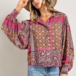 Boho long sleeve top with smocked cuffs, button front, and puff sleeves. Small